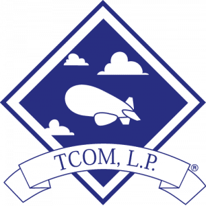 TCOM Logo in blue